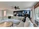 Bright living room with a large sectional sofa, accent wall, and modern decor at 2685 Maple Park Pl # 27, Cumming, GA 30041