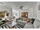 Relaxing living area features a comfortable sofa, elegant decor, and a unique black and white rug at 2685 Maple Park Pl # 27, Cumming, GA 30041