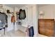 Walk-in Closet featuring wire shelving, hardwood floors, and a wooden dresser at 2685 Maple Park Pl # 27, Cumming, GA 30041