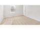 Bedroom with plush carpet, natural light from window and a standard closet door at 288 Overlook Rd, Covington, GA 30014