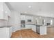 Modern kitchen boasts stainless steel appliances, granite countertops, and an island with pendant lighting at 288 Overlook Rd, Covington, GA 30014