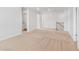 Spacious loft with neutral carpet and natural light perfect for a flexible living space or a playroom at 288 Overlook Rd, Covington, GA 30014