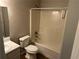 Bathroom featuring a combination of a shower over tub and single sink vanity at 5719 Star Flower Dr, Ellenwood, GA 30294