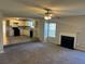 Open-concept living area combining the living room and kitchen, perfect for entertaining at 5719 Star Flower Dr, Ellenwood, GA 30294