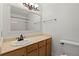 Bathroom featuring a large vanity, modern fixtures, and a shower tub at 6700 Roswell Rd # 20D, Sandy Springs, GA 30328