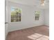 Carpeted bedroom with natural light and a ceiling fan at 6700 Roswell Rd # 20D, Sandy Springs, GA 30328