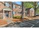 Brick townhouses with covered porches and parking at 6700 Roswell Rd # 20D, Sandy Springs, GA 30328
