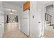 Hallway with tile flooring leading into living room at 6700 Roswell Rd # 20D, Sandy Springs, GA 30328