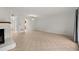 Light-filled living room with a white brick fireplace and neutral tile flooring at 6700 Roswell Rd # 20D, Sandy Springs, GA 30328