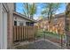 Private outdoor patio with a wood fence and access to screened in porch at 6700 Roswell Rd # 20D, Sandy Springs, GA 30328
