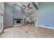 Expansive living area with a fireplace, hardwood floors, and soaring ceilings at 1762 Green Rd, Buford, GA 30518