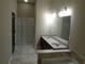 Bathroom has granite countertops, double sinks, and a glass door shower at 1835 Morning Star Ln, Tucker, GA 30084