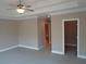 Bedroom has neutral colors, tray ceiling, and easy access to closet at 1835 Morning Star Ln, Tucker, GA 30084