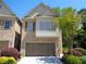 Charming brick home features a two-car garage, well-manicured landscaping, and a classic design at 1835 Morning Star Ln, Tucker, GA 30084
