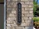 Close-up of the house number '1835' on a brick wall at 1835 Morning Star Ln, Tucker, GA 30084