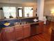 Open kitchen design with stainless steel appliances, and ample counter space for cooking at 1835 Morning Star Ln, Tucker, GA 30084