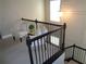 Top of the stairs, with view of chair and pillows at 1835 Morning Star Ln, Tucker, GA 30084