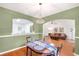 This dining room seamlessly connects to the living room and includes stylish decor at 2840 Smith Ridge Trce, Peachtree Corners, GA 30071