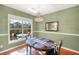 Dining room featuring a chandelier, table with seating, and view of outdoor patio at 2840 Smith Ridge Trce, Peachtree Corners, GA 30071