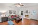 Inviting living room with hardwood floors, a fireplace, and neutral decor for a comfortable ambiance at 2840 Smith Ridge Trce, Peachtree Corners, GA 30071