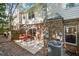Patio with seating and outdoor dining under a shade umbrella at 2840 Smith Ridge Trce, Peachtree Corners, GA 30071