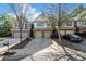 Charming townhome exterior features a two-car garage and inviting curb appeal with nice landscaping at 2840 Smith Ridge Trce, Peachtree Corners, GA 30071