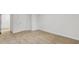 This bedroom features neutral carpet with access to other rooms at 668 Egrets Landing #64, Covington, GA 30014
