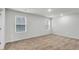 Bright bedroom boasts natural light with large windows at 668 Egrets Landing #64, Covington, GA 30014