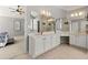 Bright bathroom with dual sinks and expansive vanity in neutral color palette at 1888 Fox Chapel Se Dr, Smyrna, GA 30080