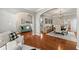 Open floor plan with dining area featuring modern lighting and hardwood floors at 1888 Fox Chapel Se Dr, Smyrna, GA 30080