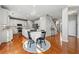 Spacious kitchen and dining area with modern appliances and hardwood floors at 1888 Fox Chapel Se Dr, Smyrna, GA 30080