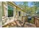 Wooden deck with grill and great view of back of property at 230 Oakmere Dr, Alpharetta, GA 30009
