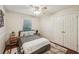 This secondary bedroom features hardwood floors and ample closet space at 230 Oakmere Dr, Alpharetta, GA 30009