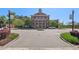 Brick building with meticulous landscaping and circular drive at 230 Oakmere Dr, Alpharetta, GA 30009