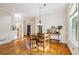Inviting dining area featuring hardwood floors and a dining table at 230 Oakmere Dr, Alpharetta, GA 30009