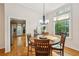 Cozy dining room featuring hardwood floors and natural lighting at 230 Oakmere Dr, Alpharetta, GA 30009