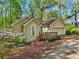 Charming home with a one-car garage, well-maintained landscaping, and inviting curb appeal at 230 Oakmere Dr, Alpharetta, GA 30009