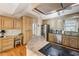 Kitchen features stainless steel appliances, built-in desk, and breakfast bar at 230 Oakmere Dr, Alpharetta, GA 30009