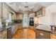 Spacious kitchen with stainless steel appliances, breakfast bar, and ample cabinet storage at 230 Oakmere Dr, Alpharetta, GA 30009