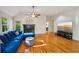 Inviting living room features a fireplace and hardwood flooring at 230 Oakmere Dr, Alpharetta, GA 30009
