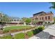 Outdoor community venue featuring manicured greenery, brick architecture and outdoor dining spaces at 230 Oakmere Dr, Alpharetta, GA 30009