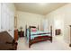 Comfortable bedroom includes a bed, closet, and access to a private bathroom at 5095 Hamby Hollow Ln, Cumming, GA 30028