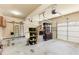 A well-organized garage space featuring storage solutions and a garage door at 5095 Hamby Hollow Ln, Cumming, GA 30028