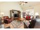 Spacious living room featuring a vaulted ceiling, hardwood floors, and a large entertainment center at 5095 Hamby Hollow Ln, Cumming, GA 30028