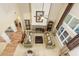Open-concept living room boasts fireplace, tall ceilings, and ample natural light at 5095 Hamby Hollow Ln, Cumming, GA 30028
