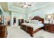 Large main bedroom features tray ceilings, neutral paint, and ample closet space at 5095 Hamby Hollow Ln, Cumming, GA 30028