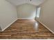 Spacious bedroom with modern flooring, neutral walls, and abundant natural light at 6718 Roscommon Dr, Austell, GA 30168