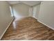 Spacious living room featuring vaulted ceilings and wood flooring at 6718 Roscommon Dr, Austell, GA 30168