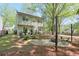 Landscaped backyard with outdoor patio, firepit, and cozy seating area great for relaxation at 1153 Haven Brook Ln, Brookhaven, GA 30319