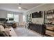 Relaxing bedroom with a ceiling fan, light gray walls and wood flooring at 1153 Haven Brook Ln, Brookhaven, GA 30319